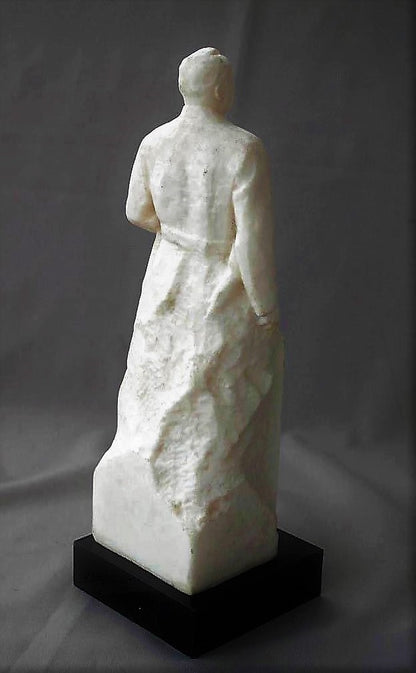 Raket geleerde. Sergei Korolev met spoetnik in de hand