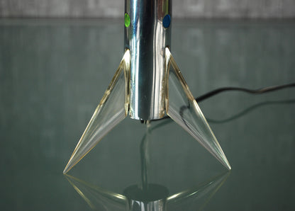 Raket lamp staand op 3 vleugels met gekleurde schijven punt. *