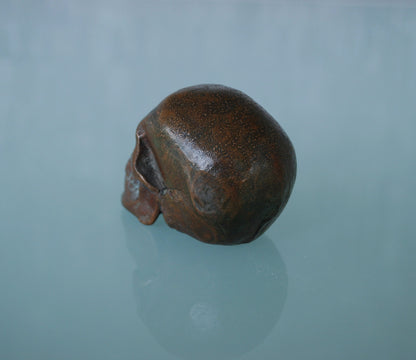 Oude schedel gemaakt van koper met prachtig patina *