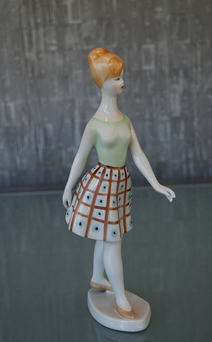 Woman Walking with Blue Polka Dot Dress *