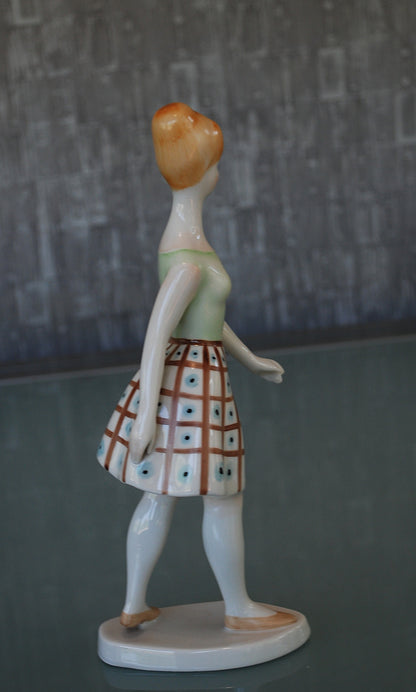 Woman Walking with Blue Polka Dot Dress *