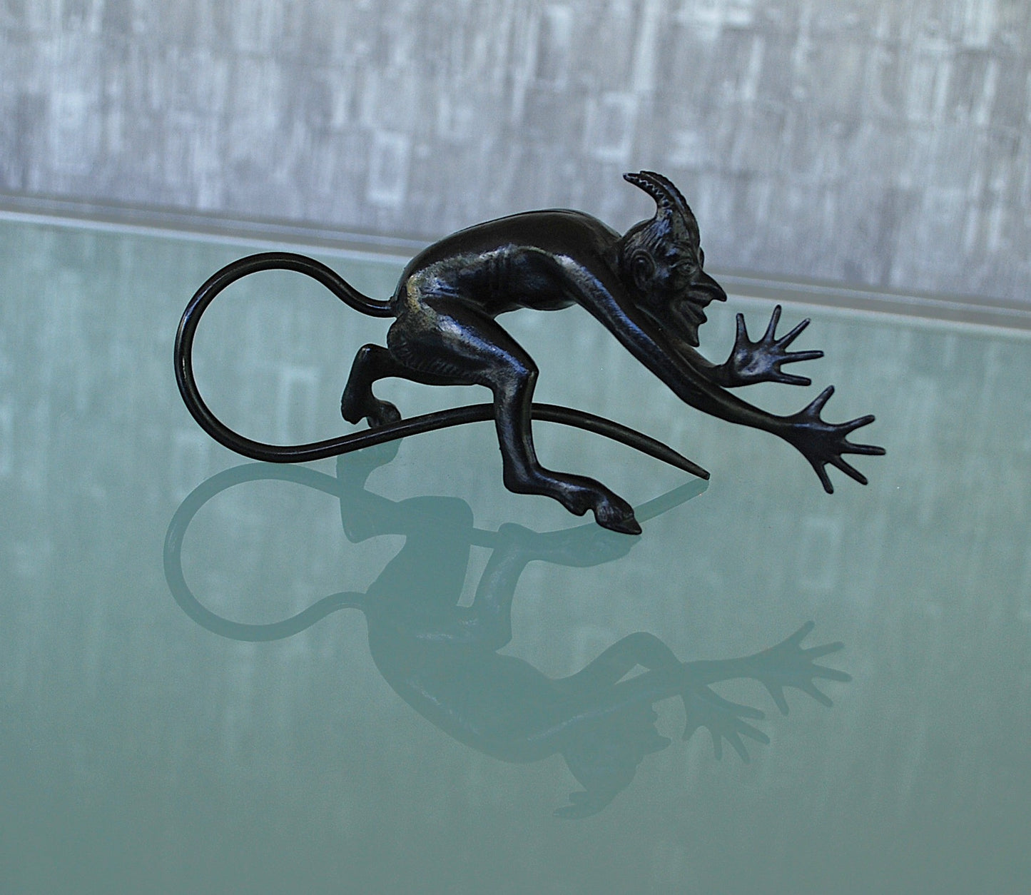 Devil pulls a long nose Kasli iron sculpture CCCP.