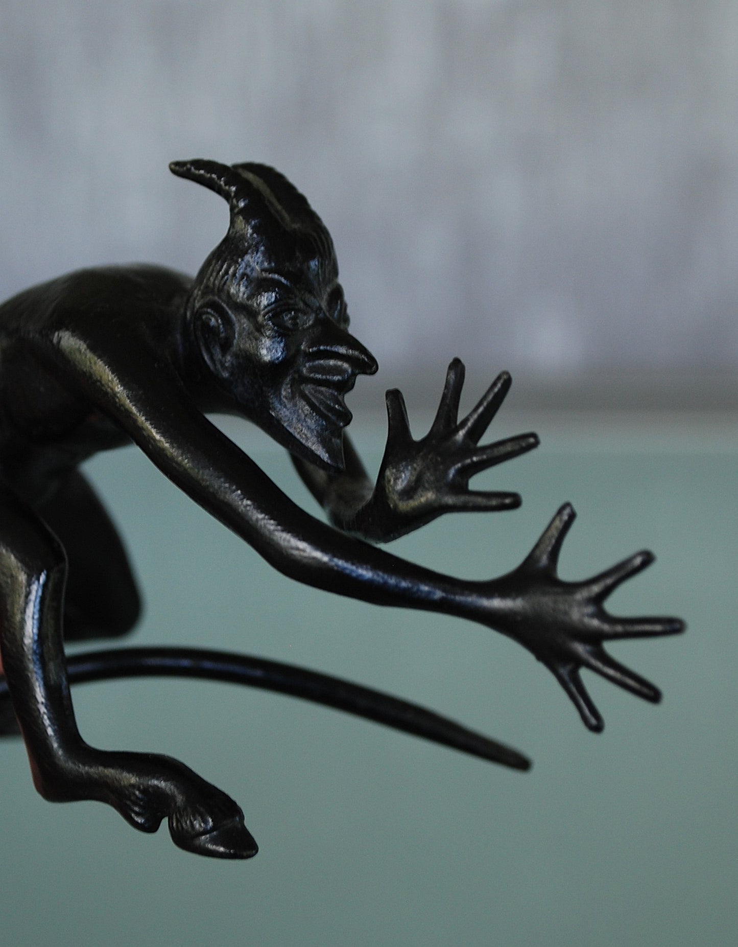 Devil pulls a long nose Kasli iron sculpture CCCP.