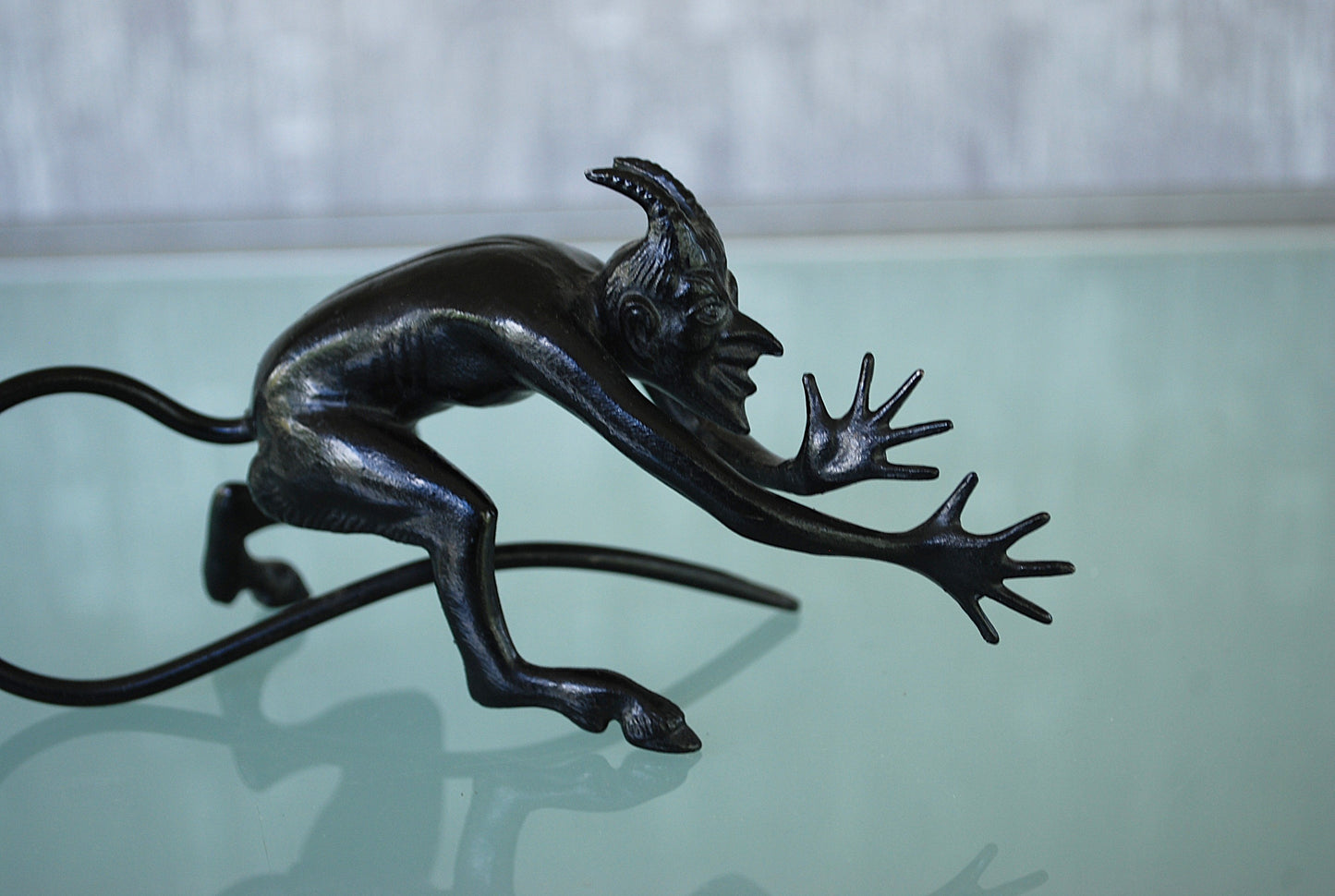 Devil pulls a long nose Kasli iron sculpture CCCP.