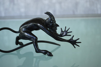 Devil pulls a long nose Kasli iron sculpture CCCP.