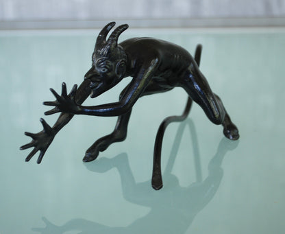 Devil pulls a long nose Kasli iron sculpture CCCP.