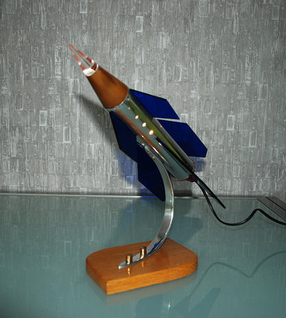 Raket lamp, Zilver met 6 blauw, paars vleugels en eboniet neuskoon