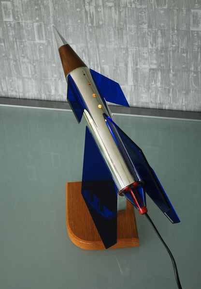 Raket lamp, Zilver met 6 blauw, paars vleugels en eboniet neuskoon