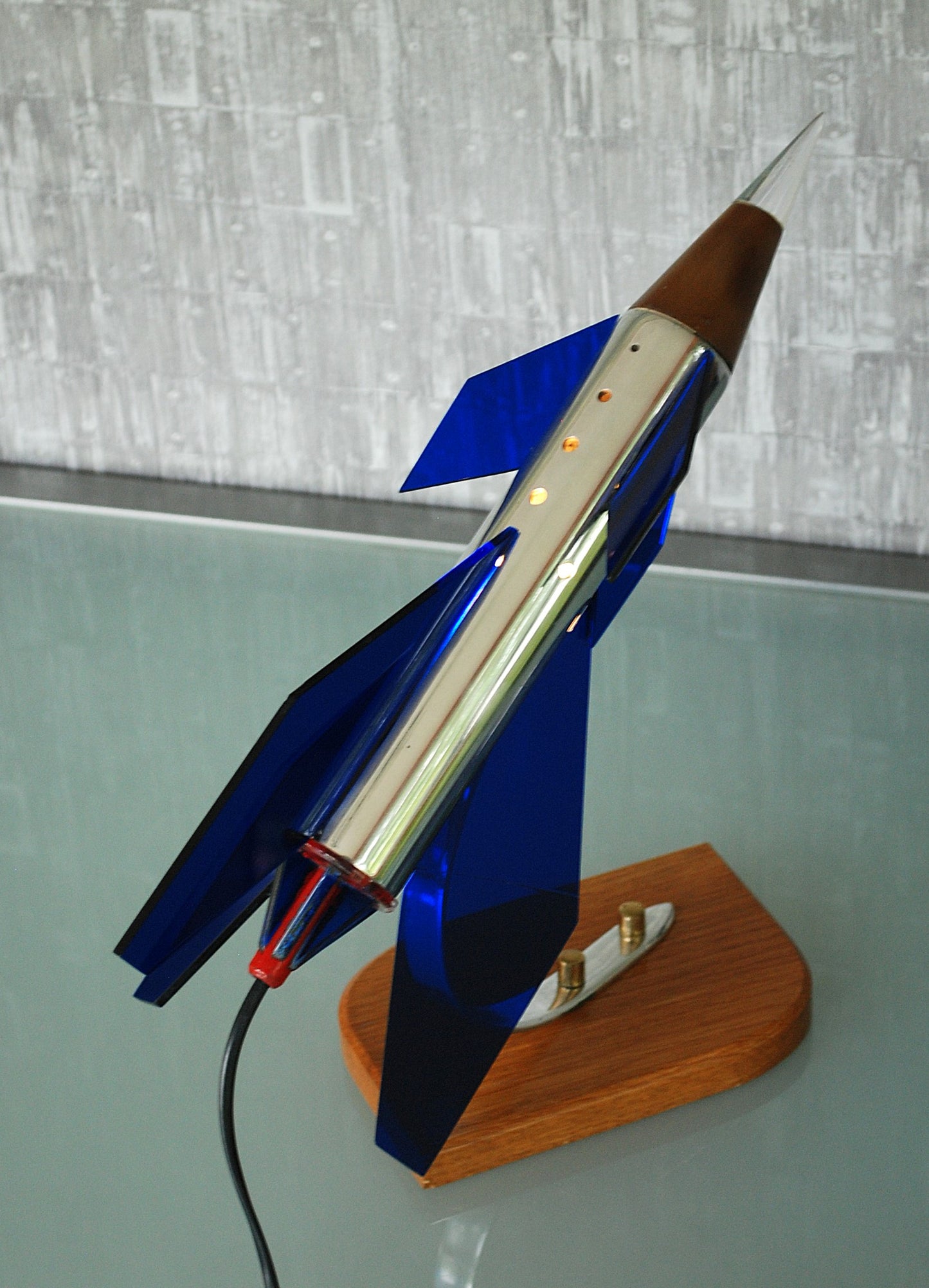 Raket lamp, Zilver met 6 blauw, paars vleugels en eboniet neuskoon