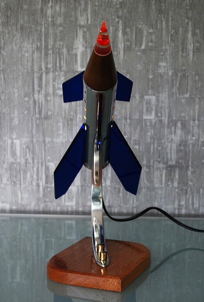 Raket lamp, Zilver met 6 blauw, paars vleugels en eboniet neuskoon